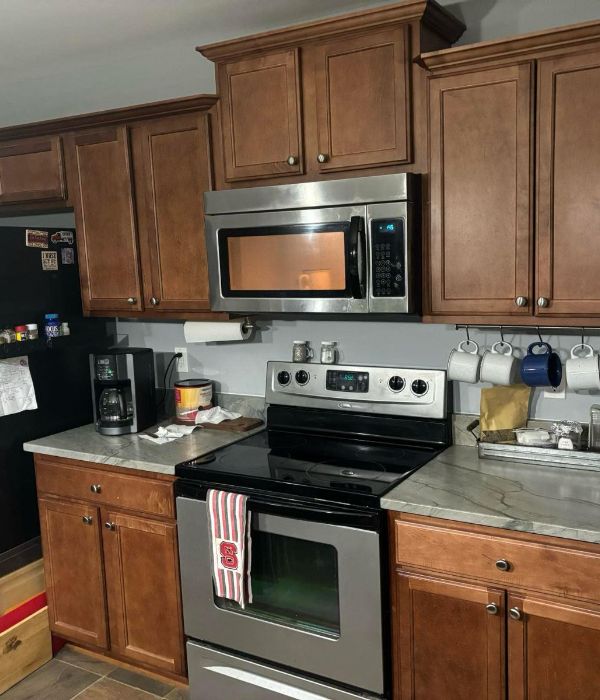Refinished kitchen cabinets in Sanford with elegance